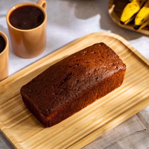 Zeppelin de banano | Pastelería Ciro Guatemala | Suave, aromático y lleno de sabor, nuestro zeppelin de banano está elaborado con una masa esponjosa que le aporta una textura delicada y un sabor inigualable. Ideal para acompañar un café o disfrutar como un antojo dulce en cualquier momento del día.